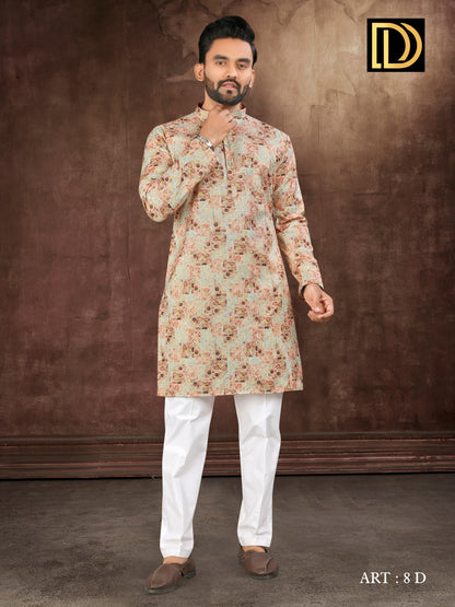 Man wearing a floral kurta with white pants against a brown background