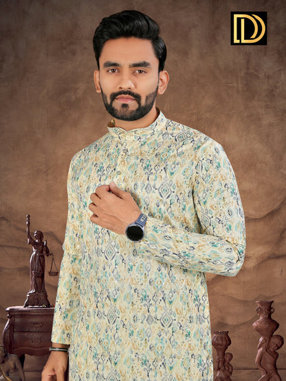 Man wearing a patterned kurta against a brown background with a logo in the corner.